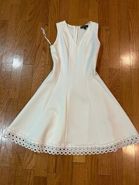 Donna Ricco White Sleeveless Fit-and-Flare Dress with Loop Hem (polyester)